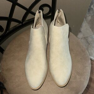 Tan ankle booties. Never worn.! Still has box they came in.